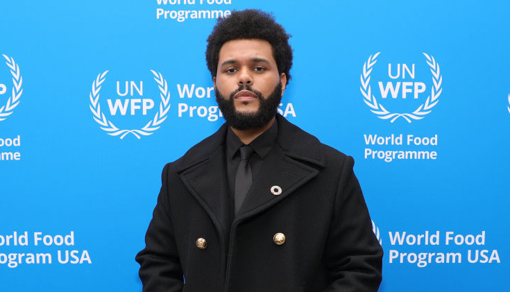 The Weeknd’s <I>Dawn FM</I> album artwork features another drastic new look